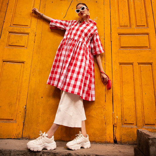 KISS AND CHECK PEPLUM DRESS