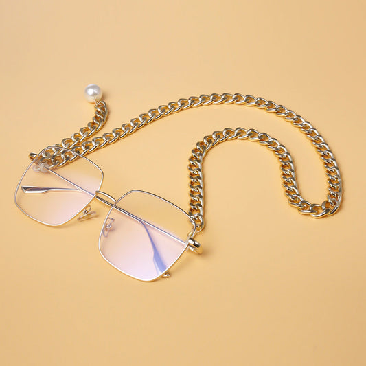 GIRL WITH A PERAL SUNGLASSES CHAIN - GOLD