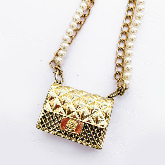 THE GOLDEN GIRL PURSE NECKLACE